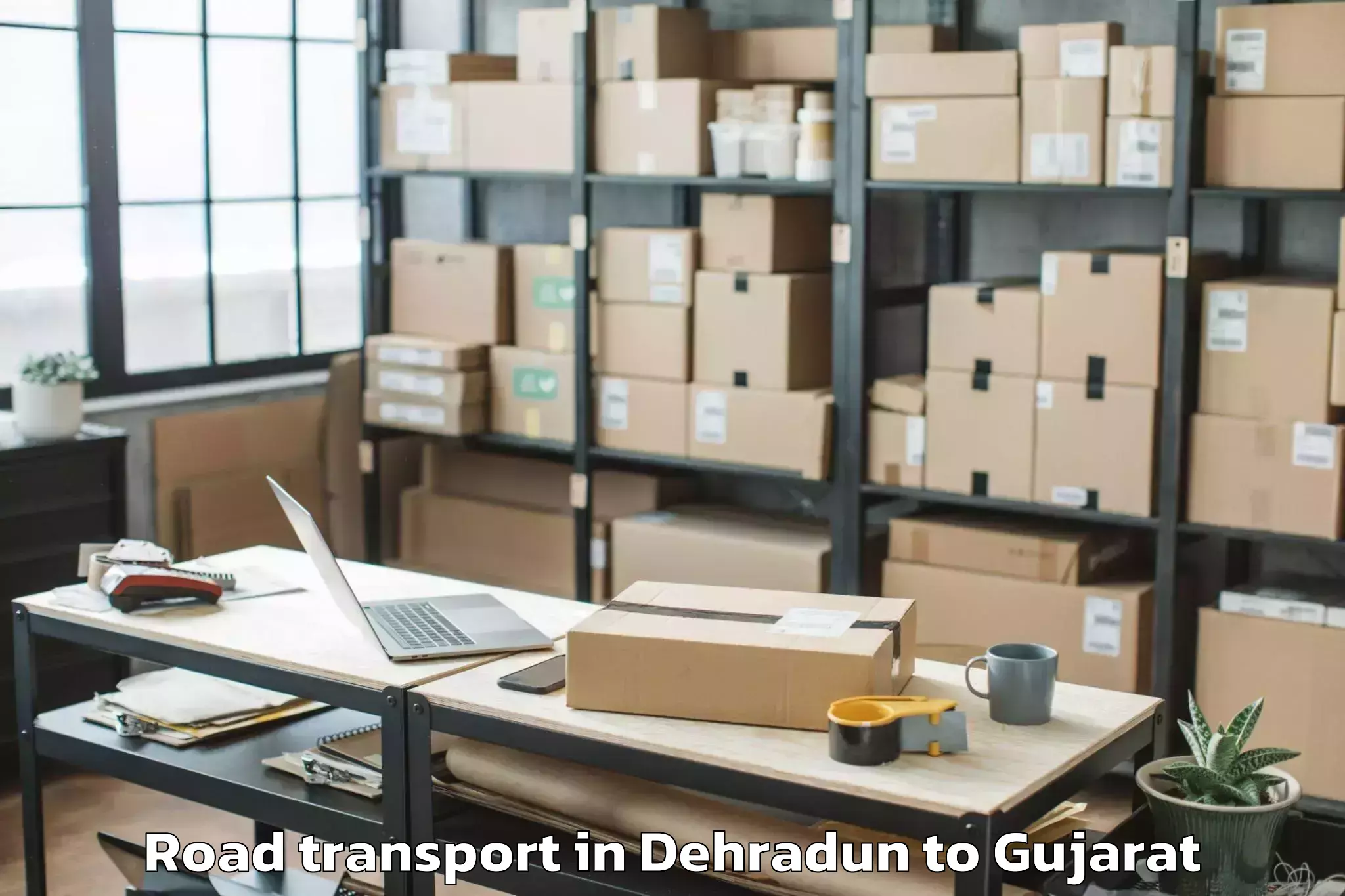 Affordable Dehradun to Savarkundla Road Transport